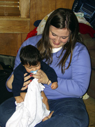 Second cousin Katie plays with Alek.