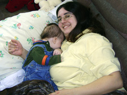 Brandy and Kenji nap on the couch.