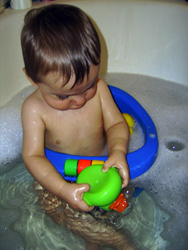 Kenji drowns the green rubber ducky.