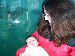 Brandy and Kenji in front of hippo tank.